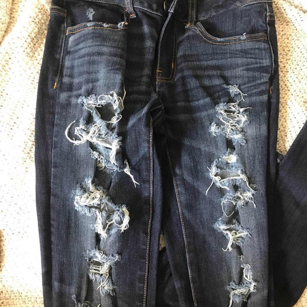 Dark wash distressed jeans